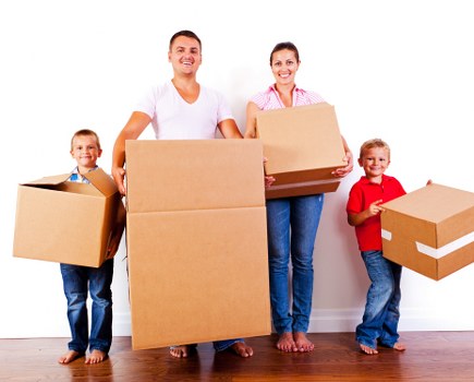 Cardboard boxes, tape, and protective packing items for moving in Harrow