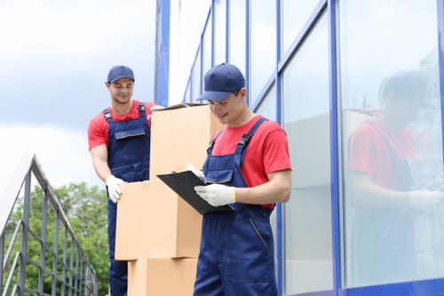 Student removals team loading boxes for a Harrow move