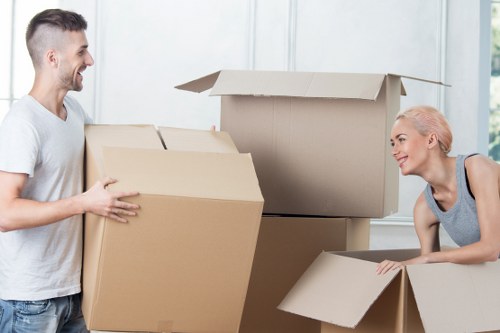Careful loading of furniture into a removals vehicle for a Harrow move