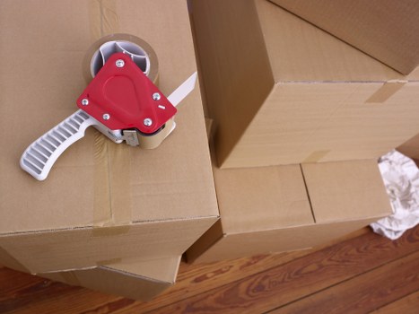 Local packing team preparing boxes for a property move in Harrow