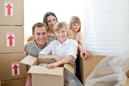 Careful loading of household items for a Harrow relocation
