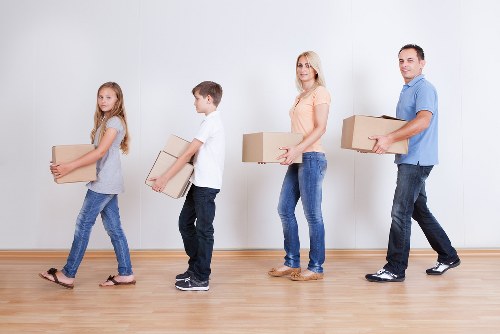 Household boxes and furniture ready for a move in Harrow