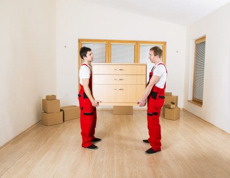 Furniture being loaded into a local removal van in Harrow